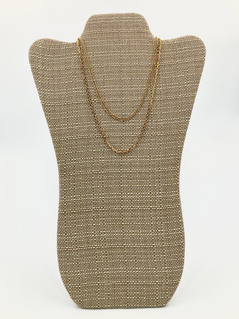 Golden metal triple necklace