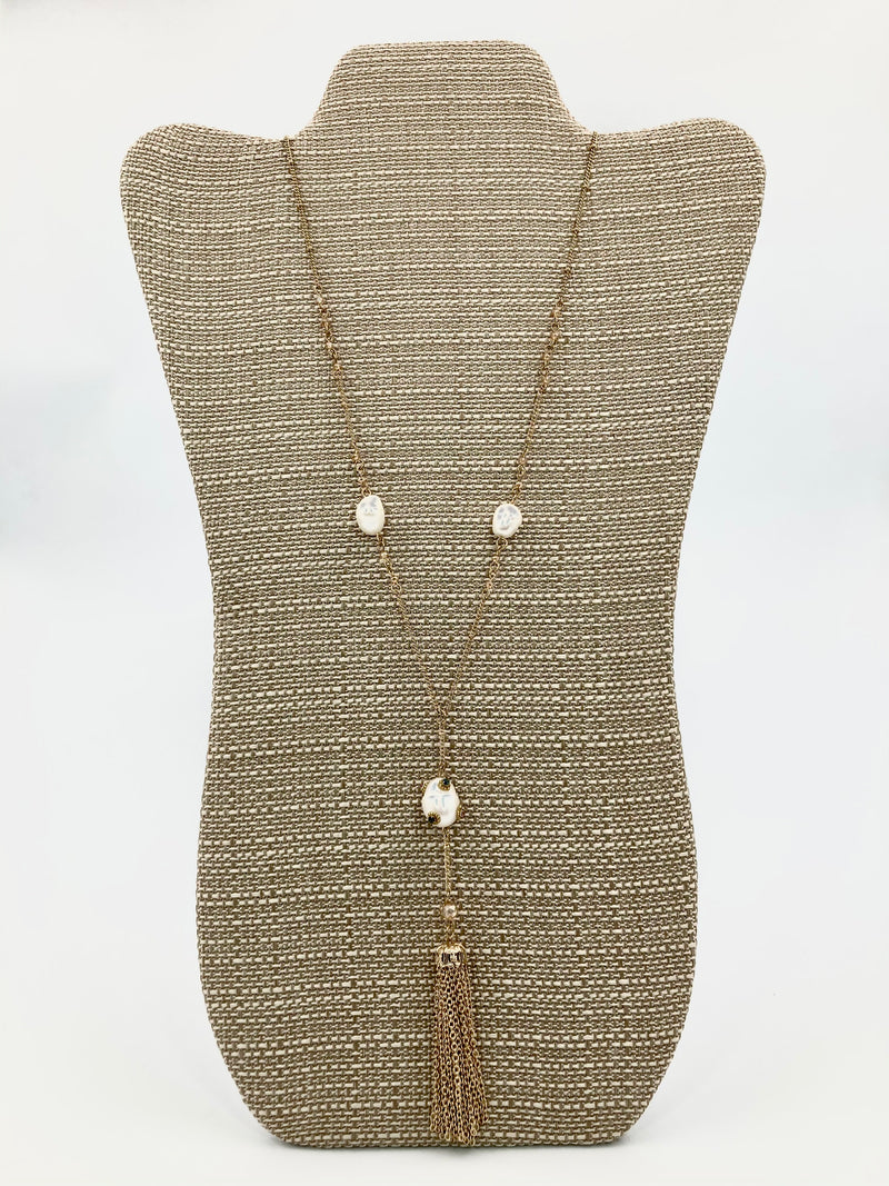 Long necklace with pearls and rhinestones