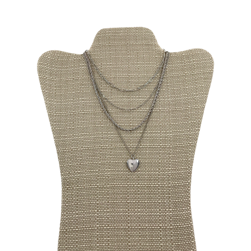 Quadruple necklace with heart pendant in silver metal