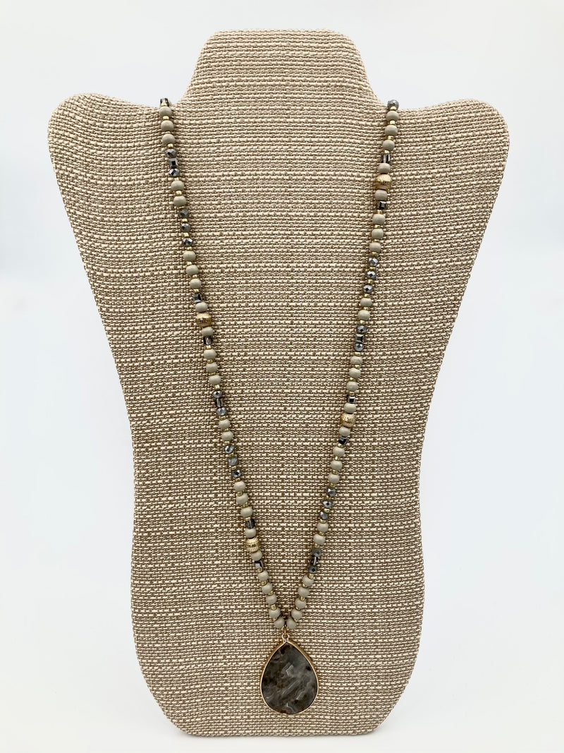 Handmade necklace with natural stones and golden details